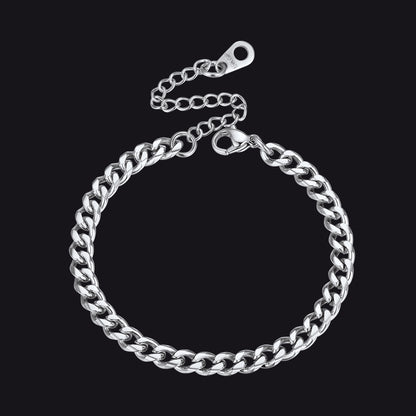 Silver chain bracelet on a black background