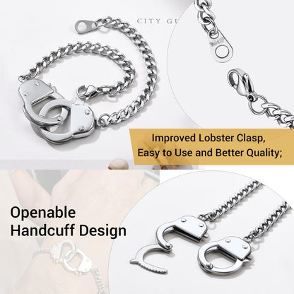 Silver handcuff keychain with openable design and improved lobster clasp on a white background.