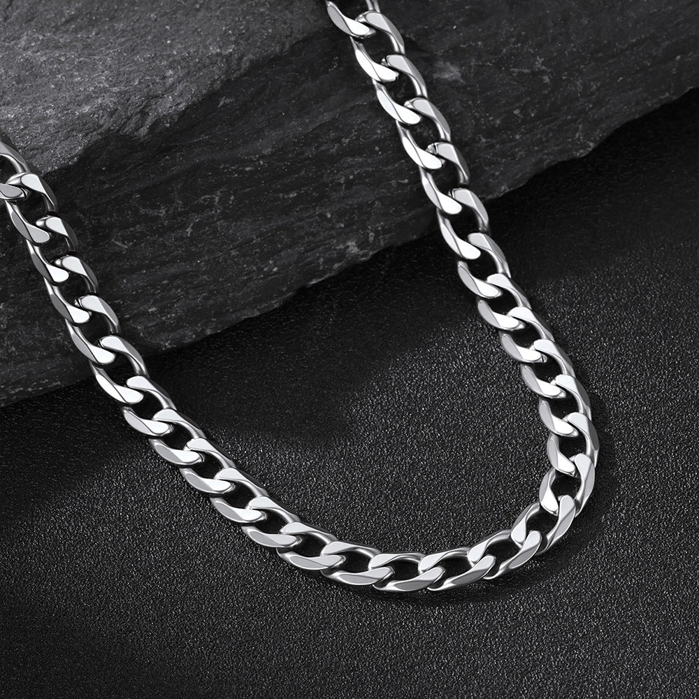 6MM Steel cuban chain necklace on a dark stone surface