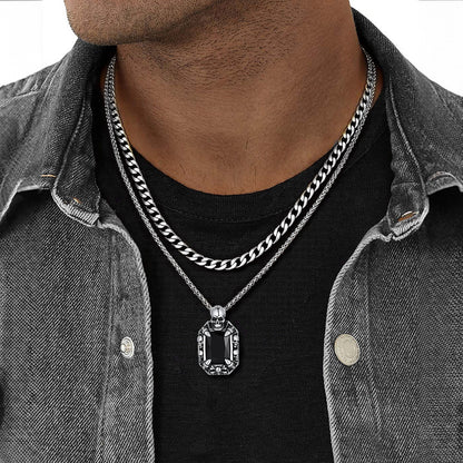 Male model wearing Gothic skull dragon claw crystal pendant with Cuban chain