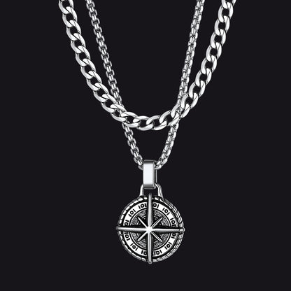 Stainless steel Cuban chain with detailed Polaris compass pendant for men.