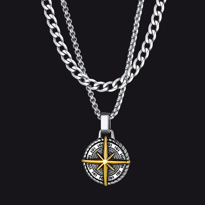 Layered Cuban chain and compass pendant necklaces