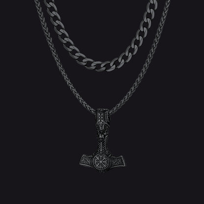 Men’s Cuban chain and Thor’s hammer pendant necklace styled for rugged look.
