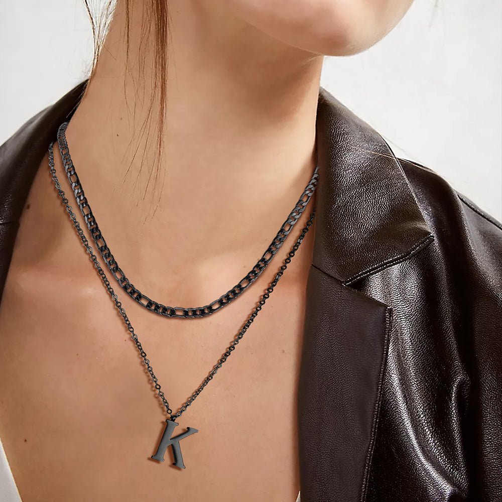 Woman Layering Figaro Necklace with Other Jewelry