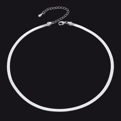 Silver necklace on a black background