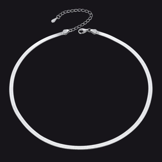 Silver necklace on a black backgroundimg