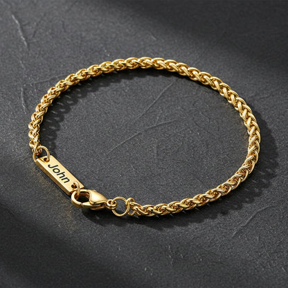 Personalized bar wheat chain bracelet flat lay