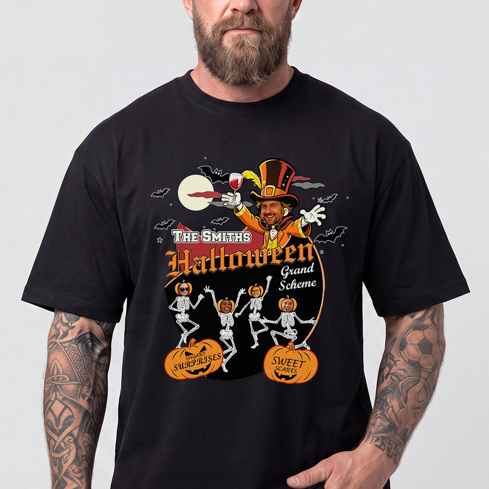 A man wearing a black graphic t-shirt featuring a Halloween-themed design with 'The Smith's Halloween Grand Scheme' text, cartoon skeletons, and jack-o'-lanterns.