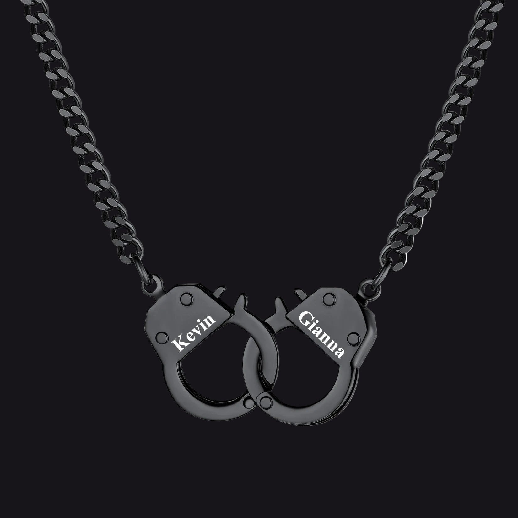 A black metal chain necklace with a pendant shaped like two interlocking handcuffs. 
