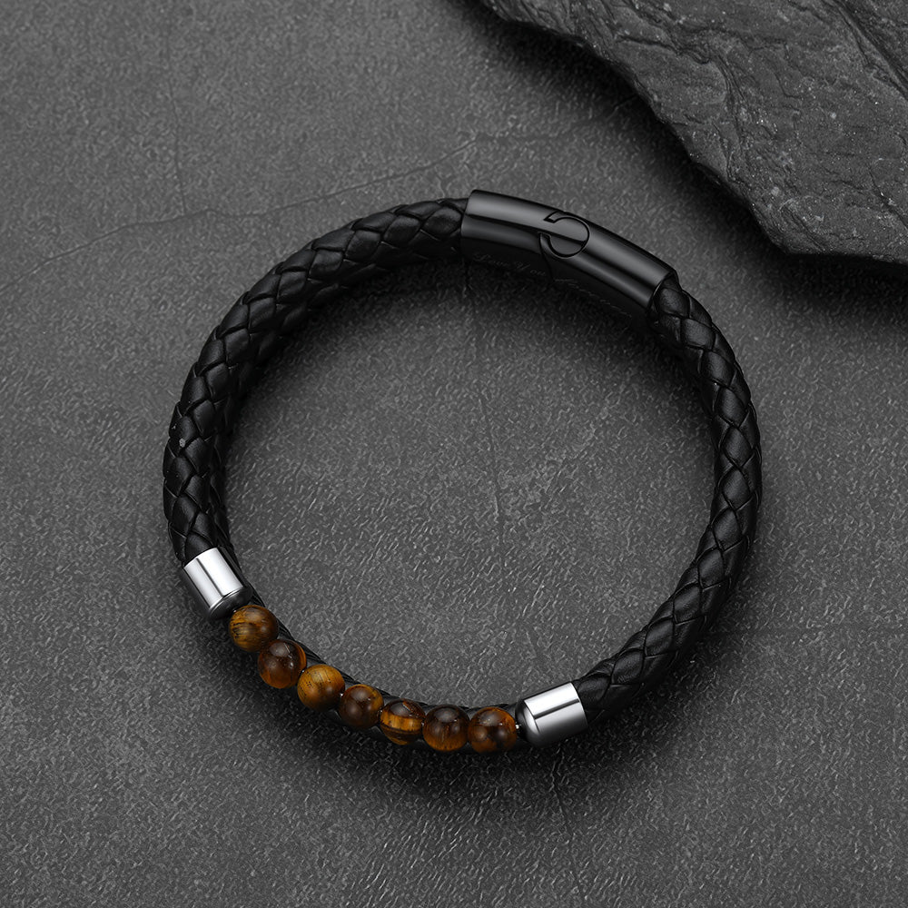 Front and side view of tiger eye protection bracelet with leather band and engraved tag