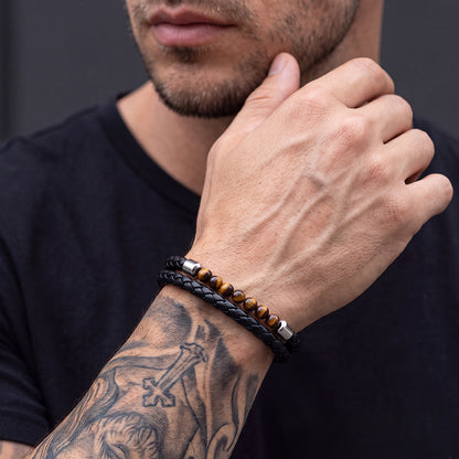 Man wearing personalized tiger eye leather protection bracelet on wrist