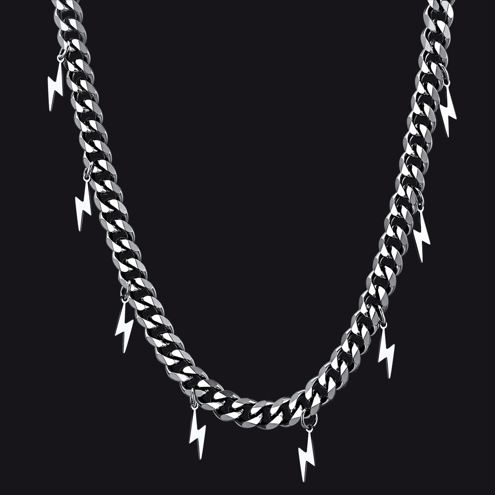 Silver chain necklace with lightning bolt pendants on a black background