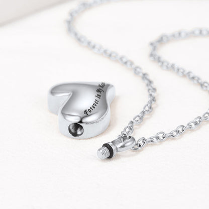 Threaded screw opening detail on heart cremation necklace for secure sealing