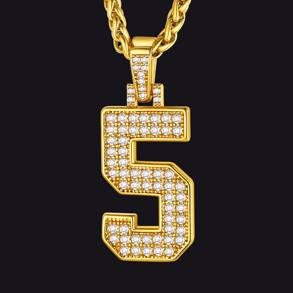 Gold necklace with a diamond-encrusted number '5' pendant on a black background