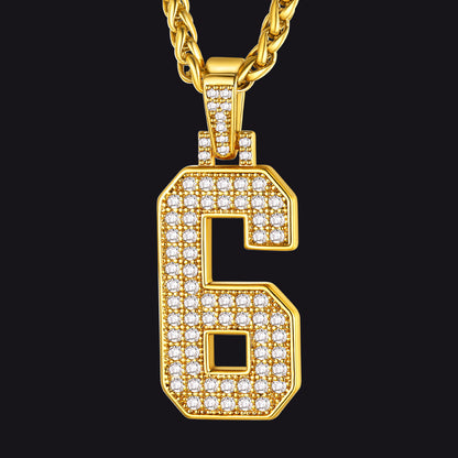 Gold necklace with a diamond-encrusted number '6' pendant on a black background