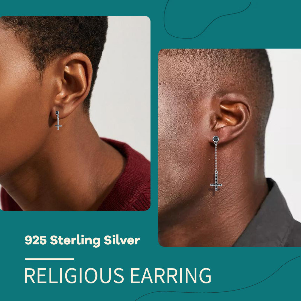 925 Sterling Silver Religious Earring worn by a person on a teal background