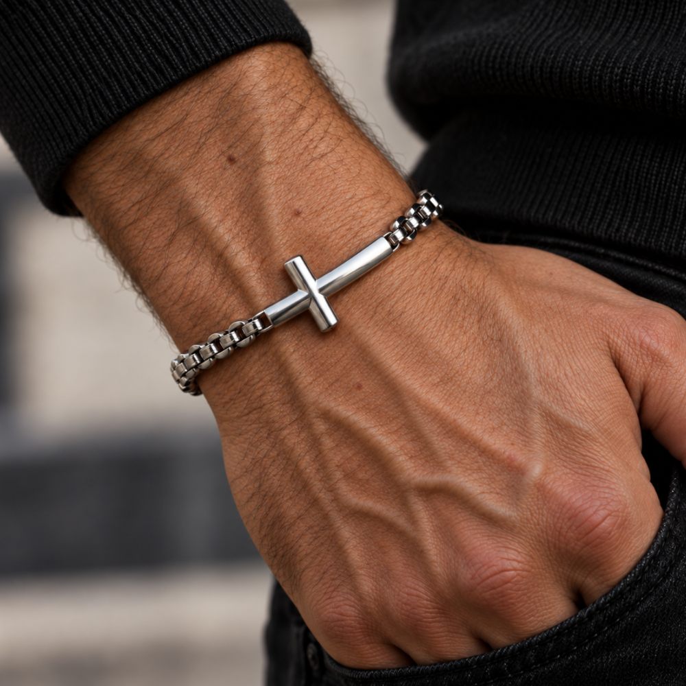 Man wearing cross cuban link chain bracelet