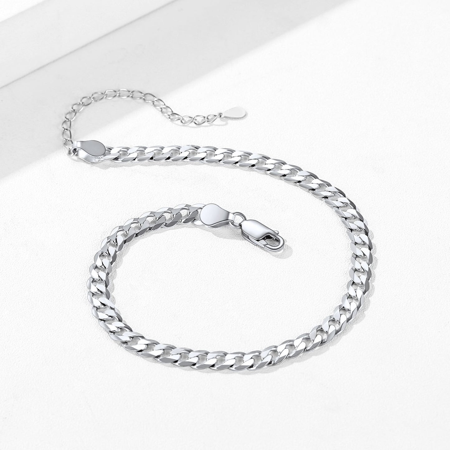 Lobster clasp detail on silver beach anklet