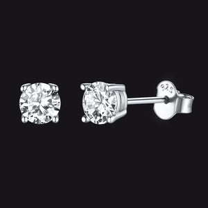 Pair of diamond stud earrings on a black background