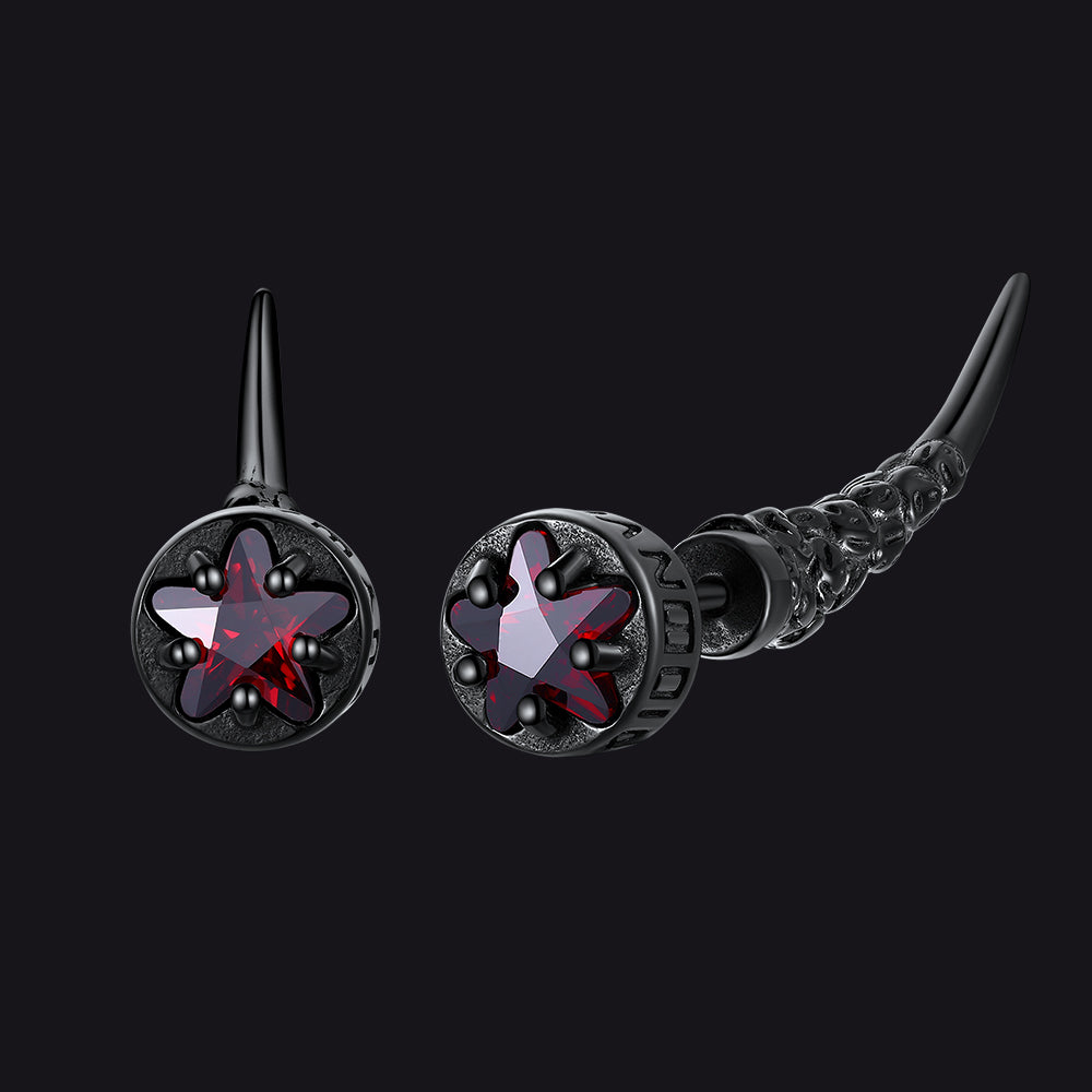 Pair of black and red earrings on a black background