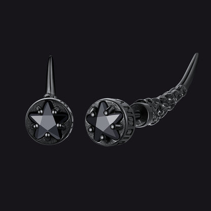 Black star-shaped earrings on a black background