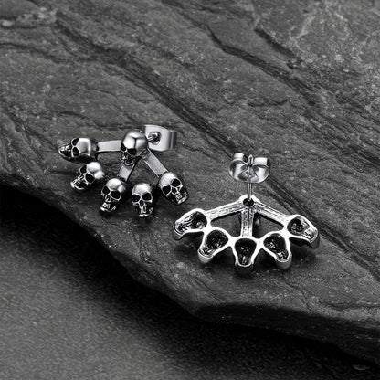 Gothic multiple skull stud earrings photographed