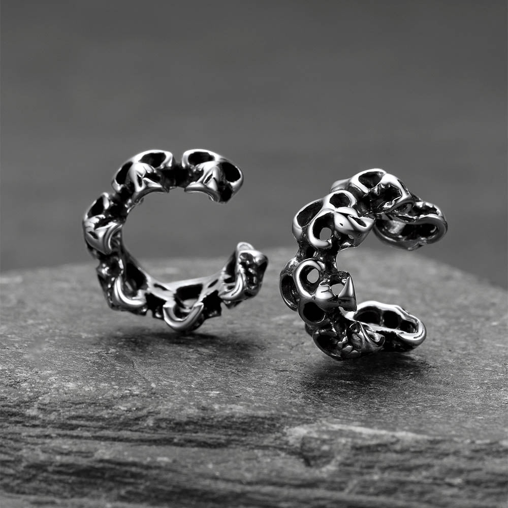 Gothic hollow skull clip ear cuff accessory for men in grey tone.