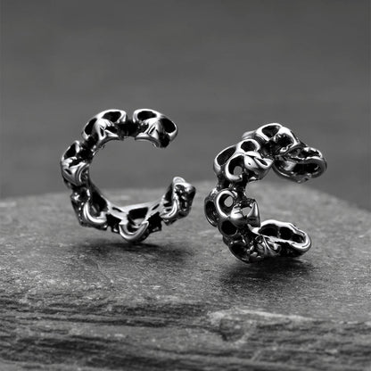 Gothic hollow skull clip ear cuff accessory for men in grey tone.