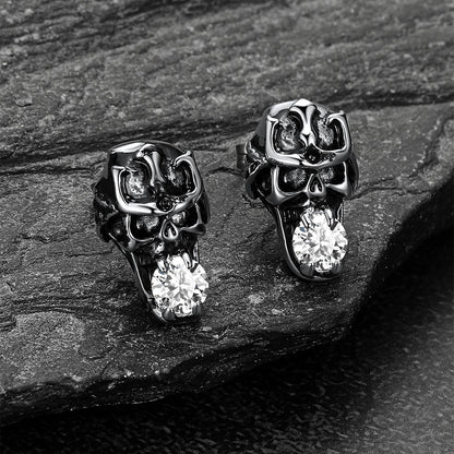 Skull stud earrings for men paired with gothic fashion.