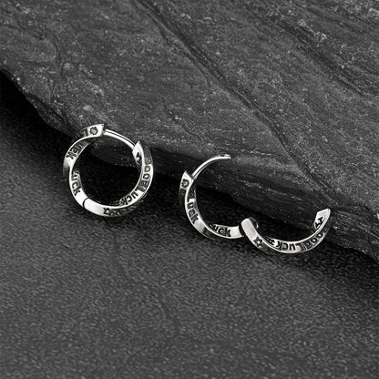 Engraved Luck copper Mobius hoop earrings close-up view