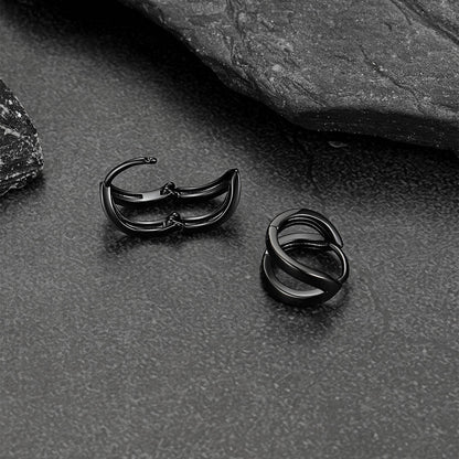 Close-up of black hoop huggie earrings for men and women