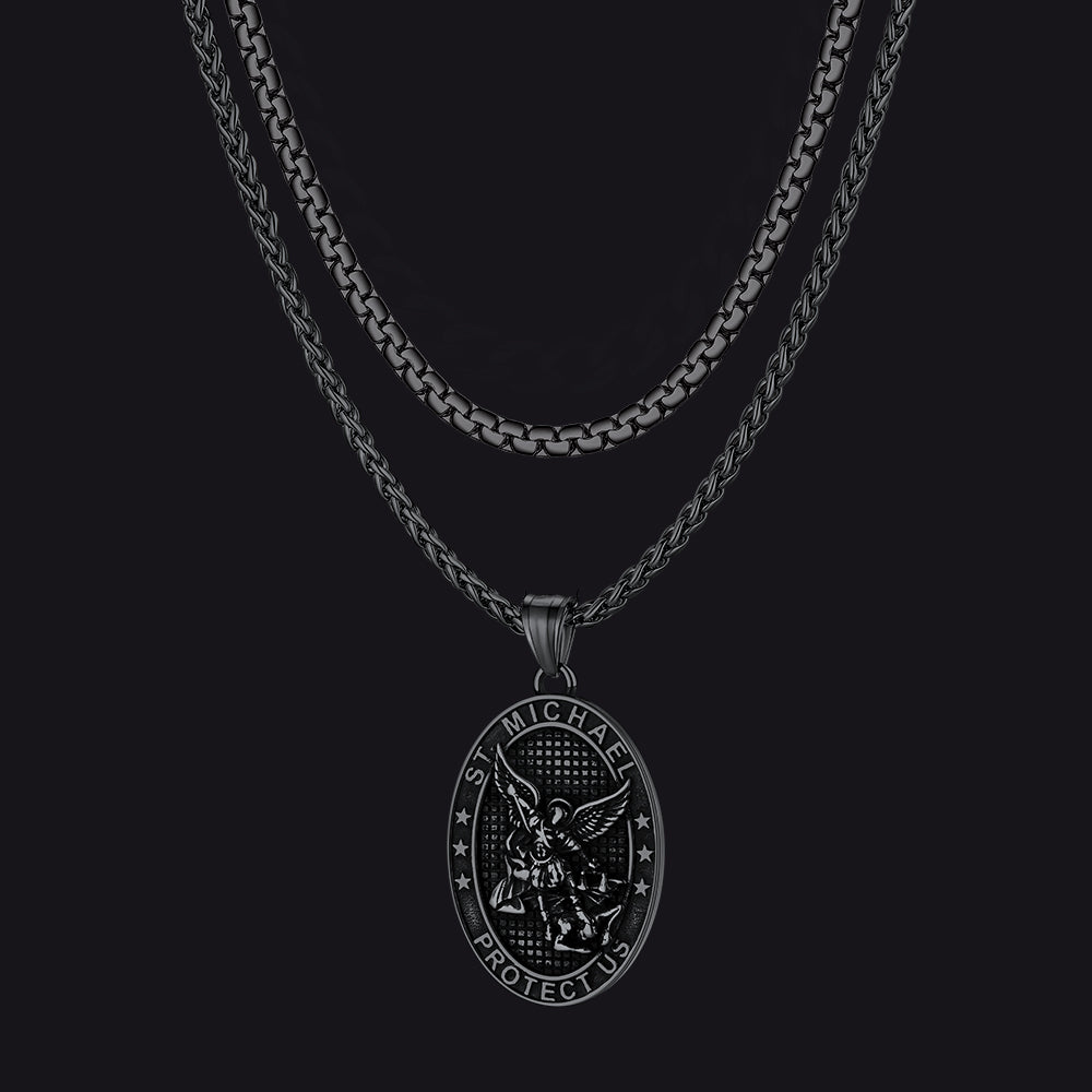 Black metal necklace with pendant on a black background
