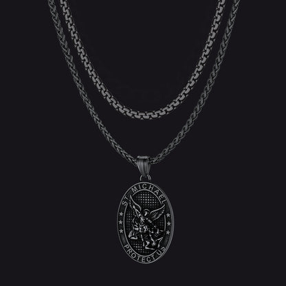 Black metal necklace with pendant on a black background