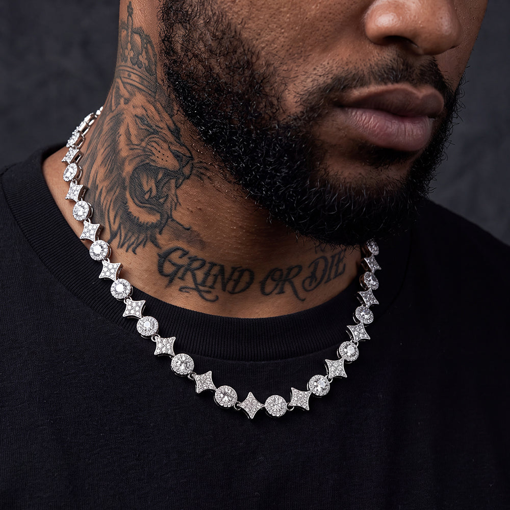 A close-up of a man wearing a Cubic Zircon Four Pointed Star Link Tennis Necklace