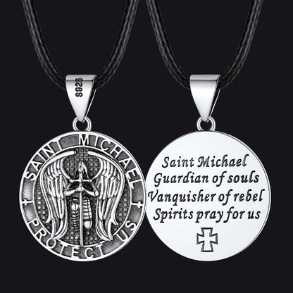 Saint Michael pendant necklaces on black cords with detailed designs.