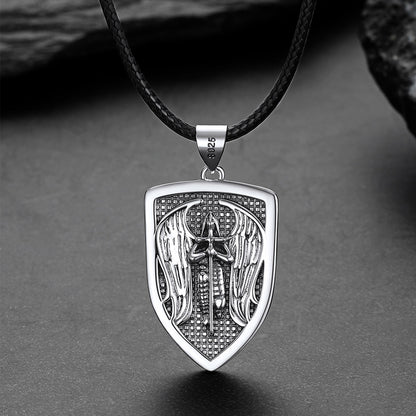 Silver pendant with intricate design