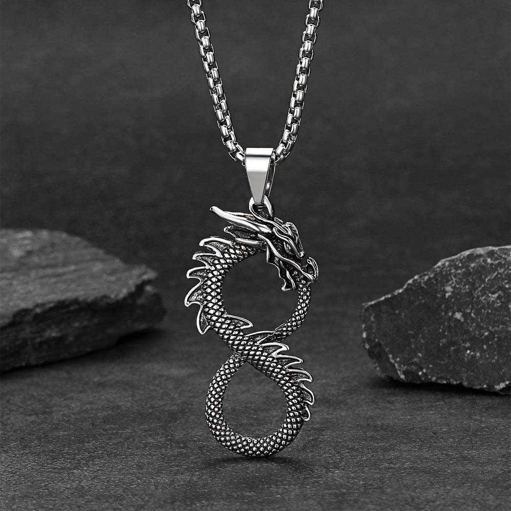 Dragon infinity necklace displayed on black background