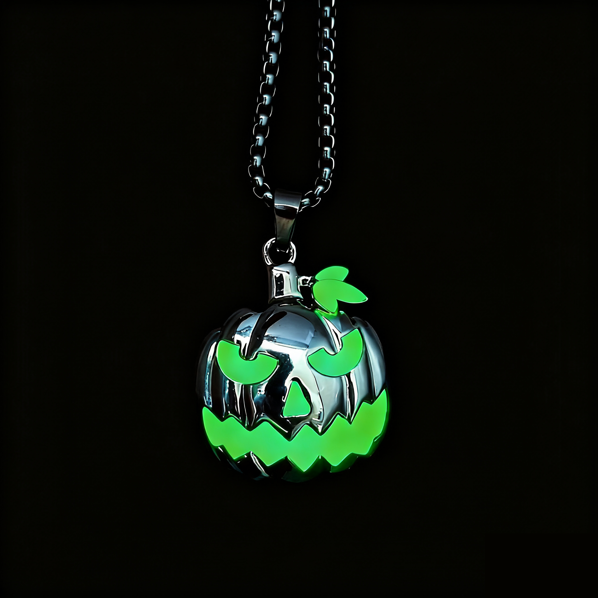 Close-up of glowing skull pumpkin pendant for Halloween accessory