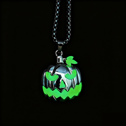 Luminous pumpkin skull pendant necklace glowing in darkness