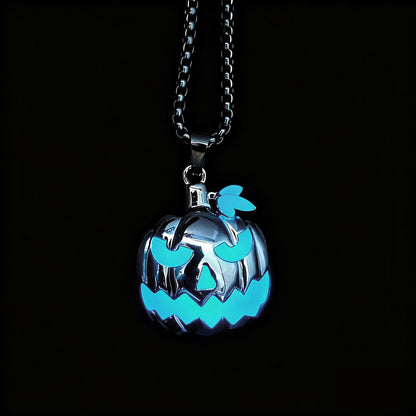 Close-up of glowing skull pumpkin pendant for Halloween accessory