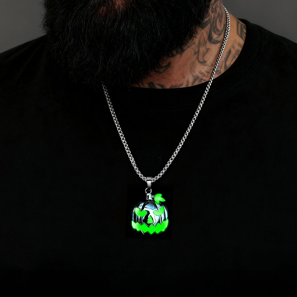 Neon green pendant on a chain against a black background
