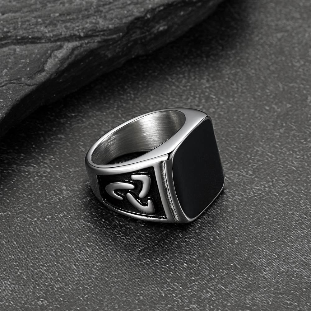 Square signet ring with black onyx and Celtic knot design