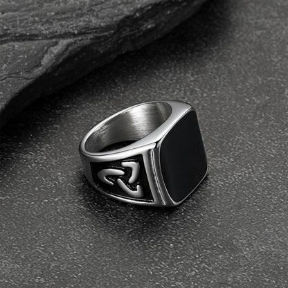 Square signet ring with black onyx and Celtic knot design