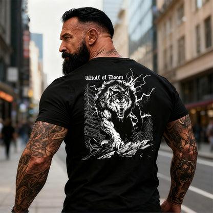 Man wearing a black t-shirt with a wolf graphic and 'Wolf of Doom' text on the back, standing in an urban setting.