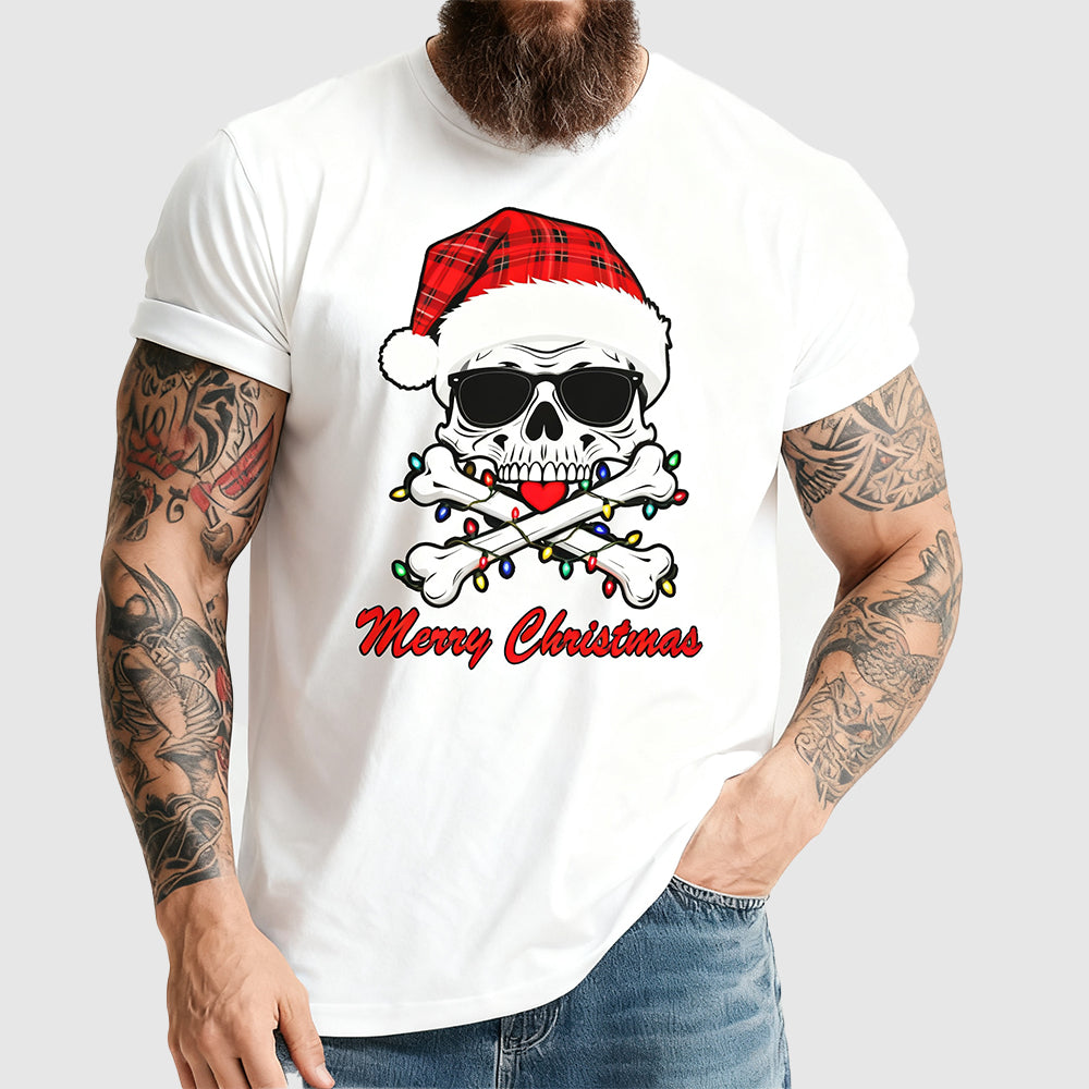 Person wearing a white t-shirt with a skull and crossbones design wearing a Santa hat and Christmas lights, with 'Merry Christmas' text.