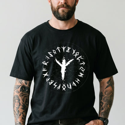 Man wearing a black t-shirt with a white viking rune design on a plain background