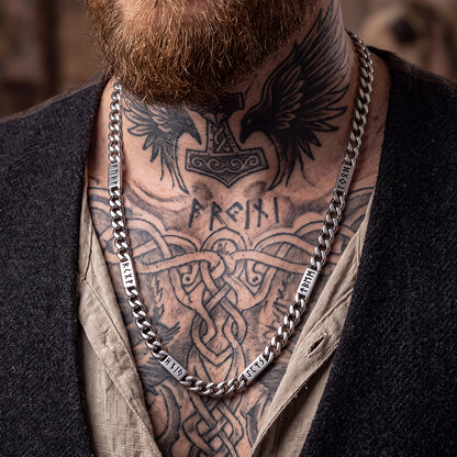 Man wearing Viking rune Futhark alphabet Cuban link chain necklace in steel finish