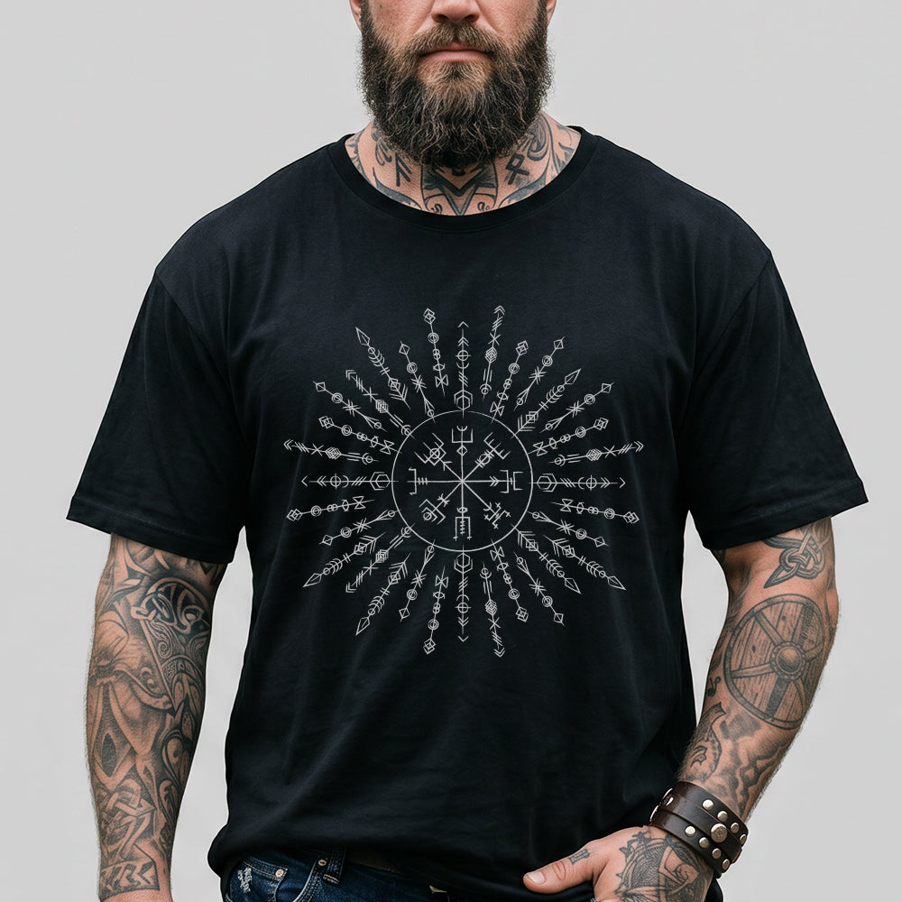 Man wearing a black t-shirt with a Viking Rune design on a plain background