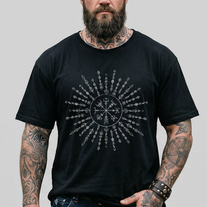 Man wearing a black t-shirt with a Viking Rune design on a plain background