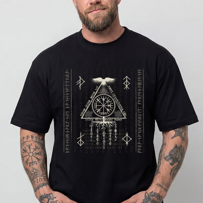 Man wearing a black t-shirt with white geometric design and text.
